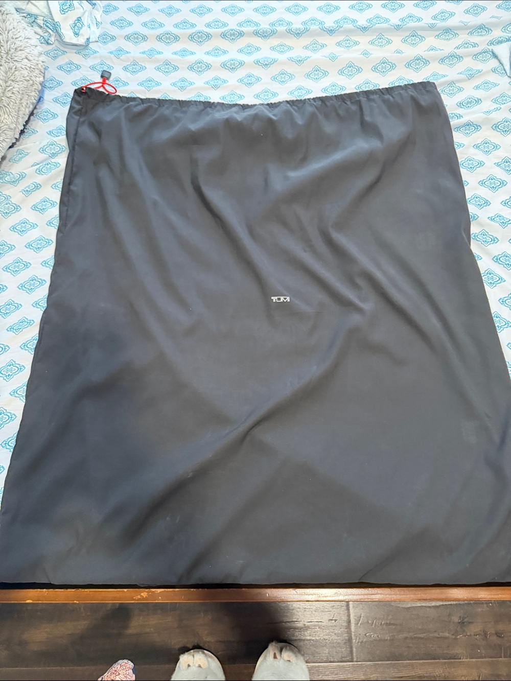 Tumi Black Suitcase Cover with Red Drawstring